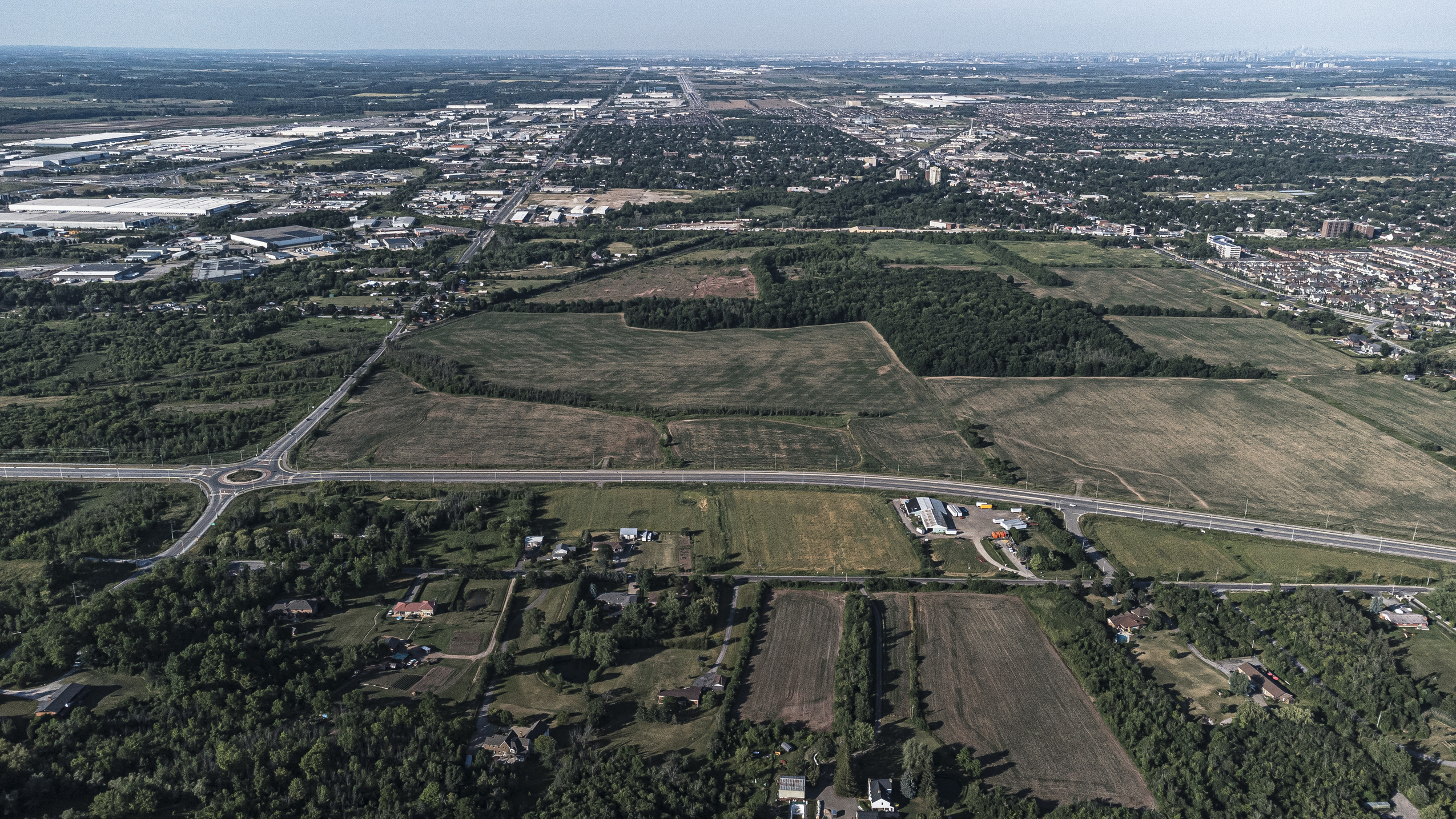 Ontario Greenbelt: an aerial view of farmland, roads and houses
