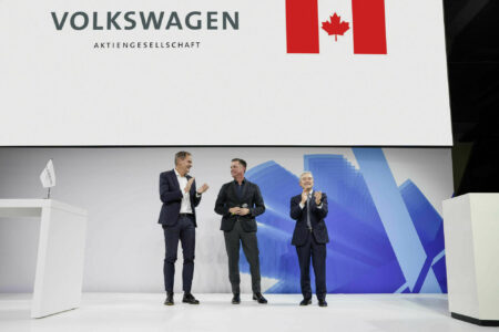 (Left to right) Oliver Blume, CEO of Volkswagen Group; Thomas Schmall, chairman of the supervisory board of PowerCo, and François-Philippe Champagne, minister of innovation, science and industry announce a new EV battery manufacturing facility for St. Thomas, Ont.