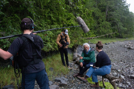 A camera crew recording Steph Wood and David Suzuki talking