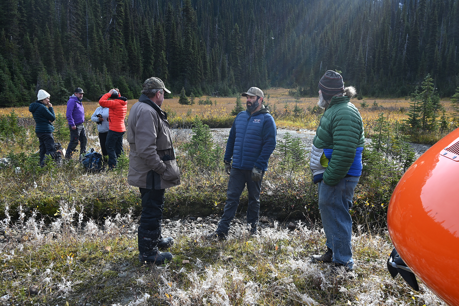 Simpcw First Nation Chief George Lampreau chats with people during a helicopter visit to the Raush Valley.