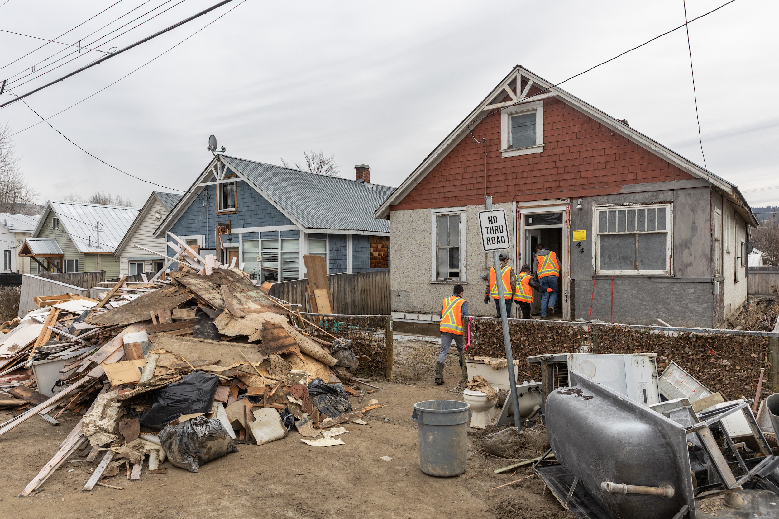 Volunteers help clear out a house that was flooded Princeton, B.C. The 2021 storm and its aftermath catapulted B.C. to the top of the list for federal Disaster Financial Assistance Arrangement payments.