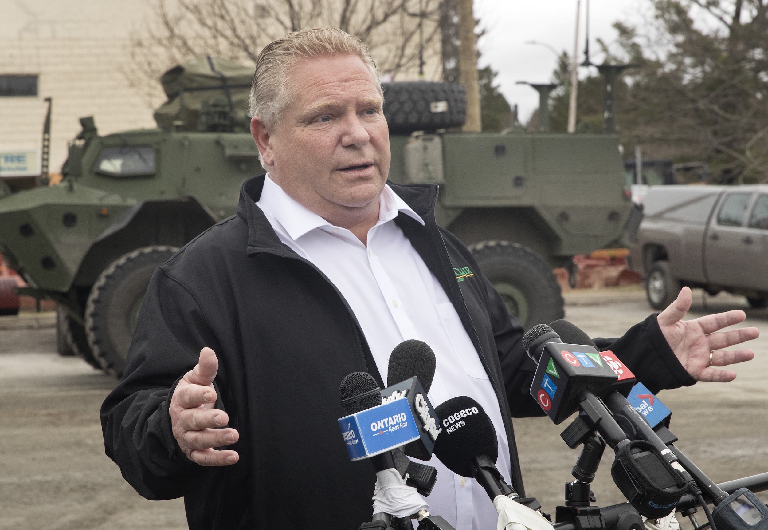 Ontario Premier Doug Ford visited Bracebridge, Ont., during severe floods in May 2019. The premier has said that his government's plan to accelerate development will not mean building on floodplains, though he also said the responsibility to ensure that lies with developers.