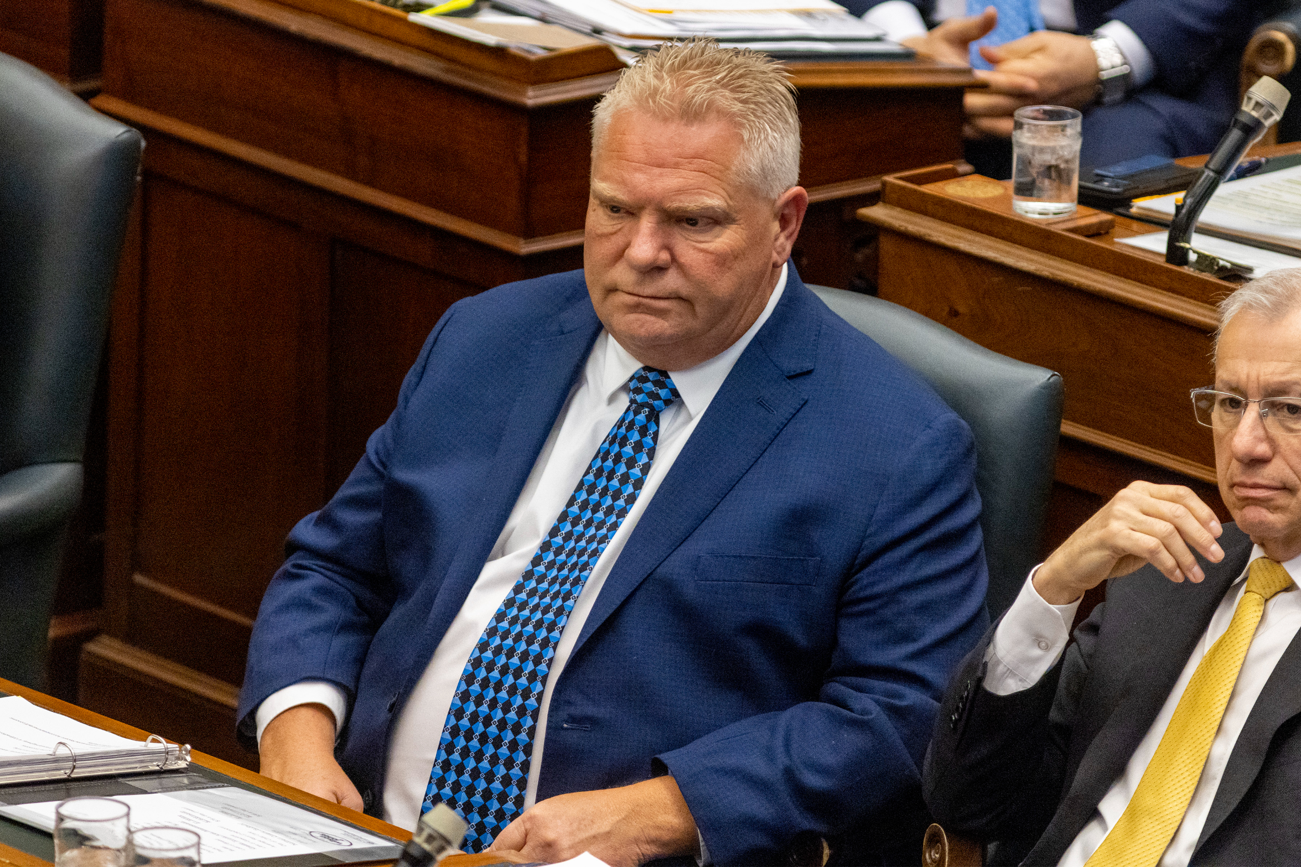 Ontario Premier Doug Ford stares straight ahead inside Queen's Park