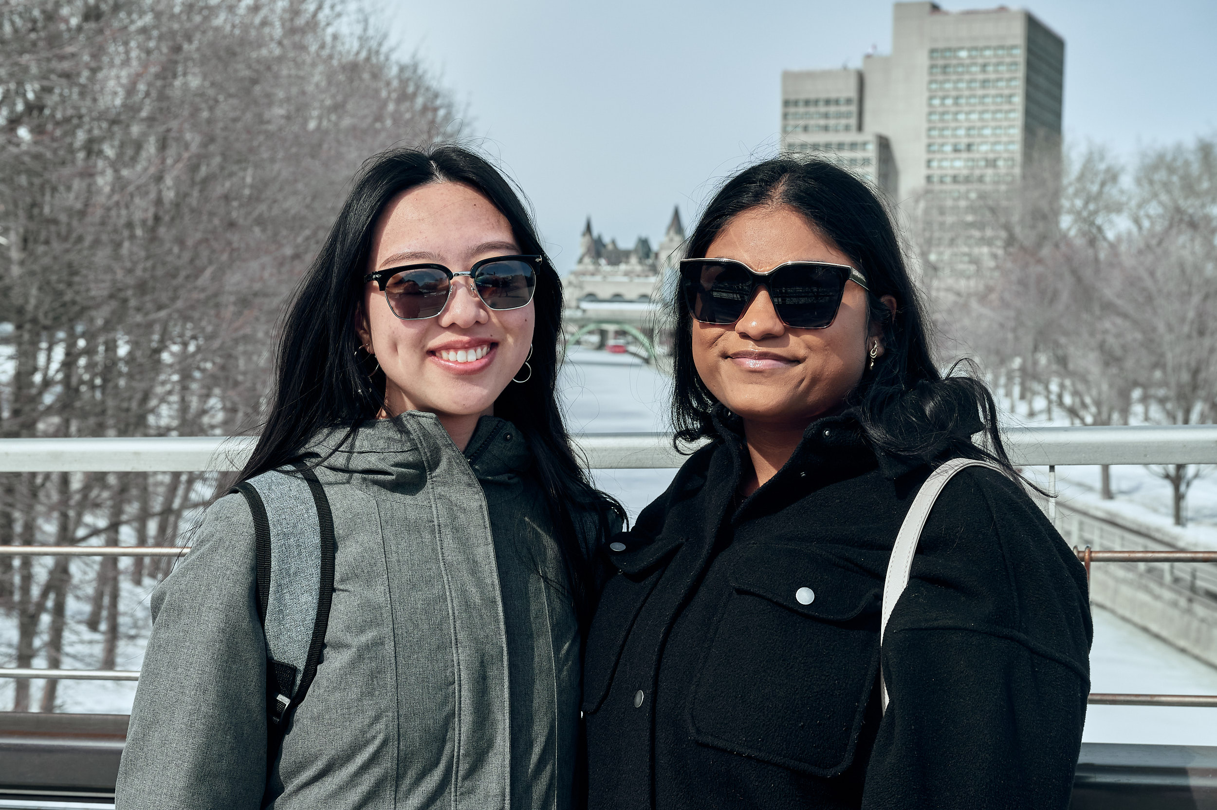 Haaruni Babu (right) and Jasmine Wong (left) by the Rideau Canal in Ottawa, which did not open for skating this winter.