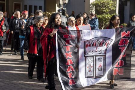 A procession by the Gitxaala Nation walking to the B.C. Supreme Court.