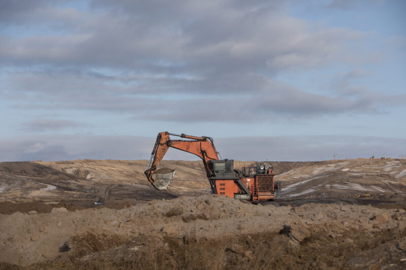 A digger clears the land at the Fort Hills oilsands mine
