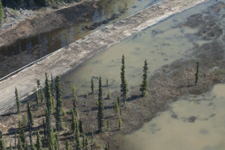 The Coastal GasLink right of way was partially submerged, with the surrounding water seemingly clouded by sediment from the worksites.