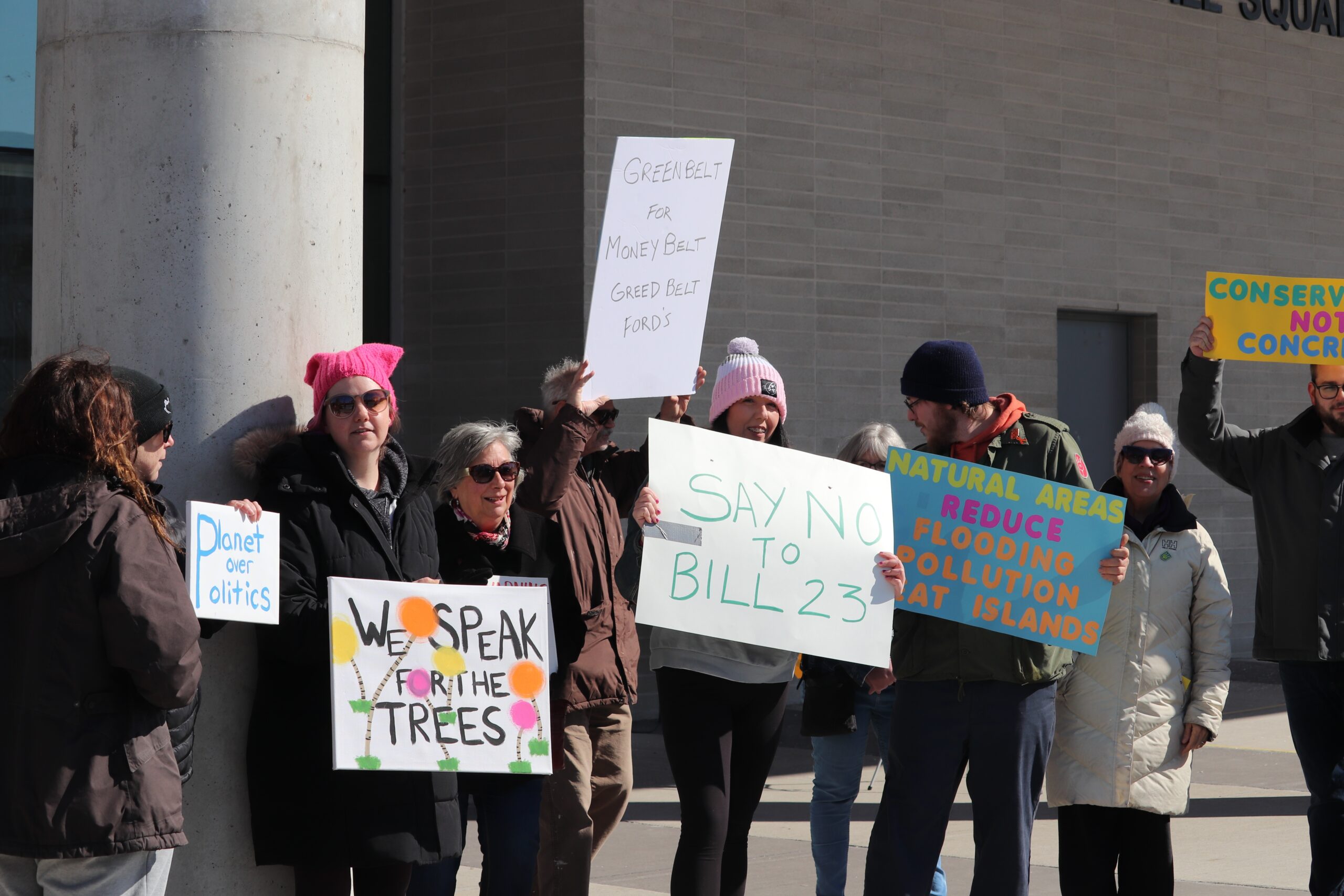 People protest against Ontario's Bill 23 outside Windsor city hall