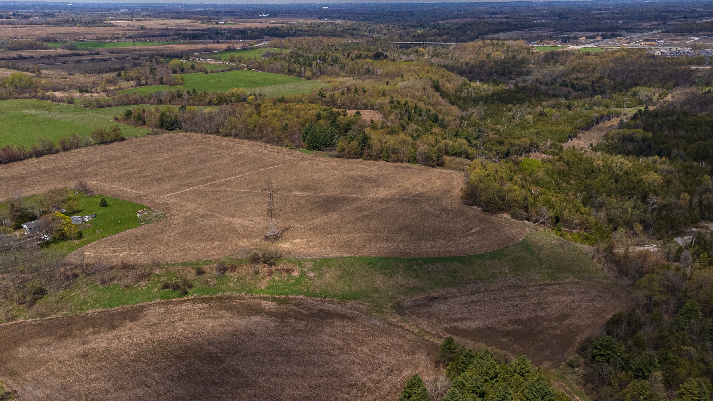 Ontario Greenbelt: farm fields and forests in the Duffins Rouge Agricultural Preserve seen from above