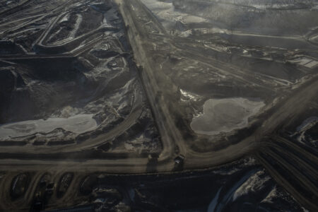A view of oilsands from above, without roads and equipment visible