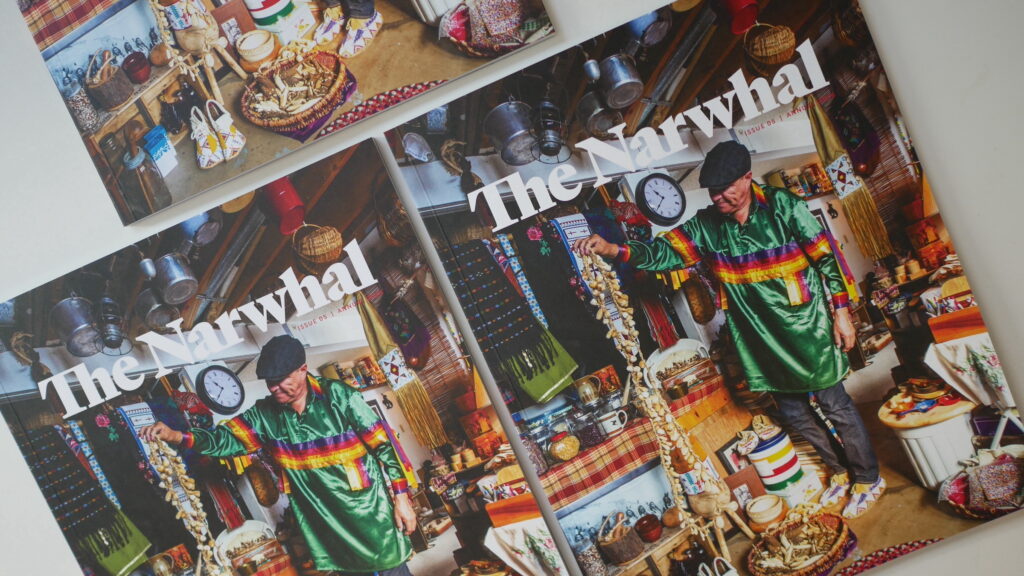 Copies of The Narwhal's 2023 print magazine stacked on top of each other.