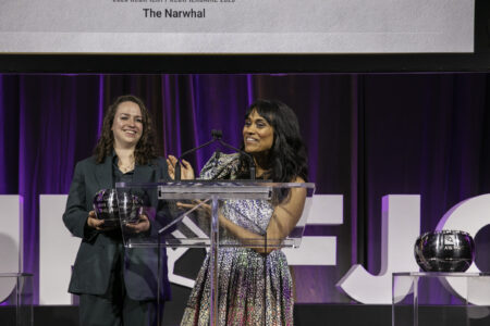 Narwhal reporter Emma McIntosh and Ontario bureau chief Denise Balkissoon accept a digital innovation prize at the Canadian Journalism Foundation's 2023 awards gala.
