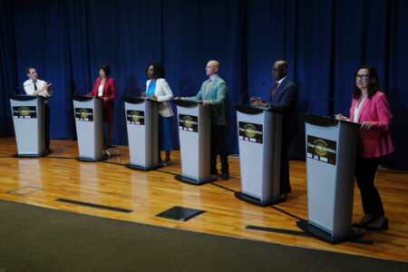 Josh Matlow (left) applauds a comment from Mitzie Hunter (centre left) as they are joined on stage by Olivia Chow (second left) Brad Bradford (centre right) Mark Saunders (second right) and Ana Bailao (right) at a Toronto Mayoral Candidates debate in Scarborough, Ont. on Wednesday, May 24, 2023.
