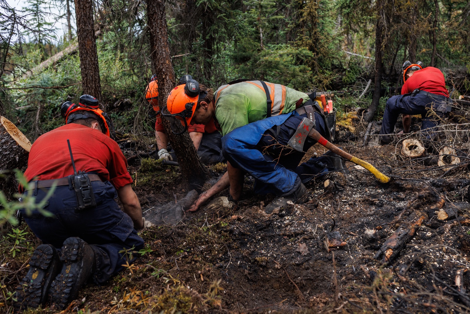 BC Wildfire: Firefighters dig deep into the forest floor to find fire hotspots
