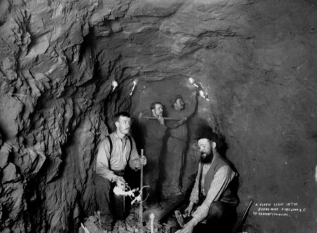 A group of miners are pictured in an underground passage at a Rossland, B.C., mine in 1898