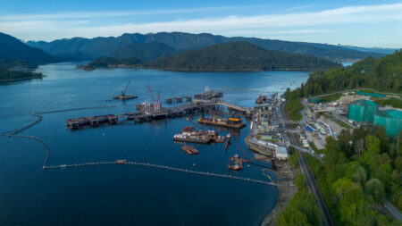 Marine terminal being built with mountains in the background