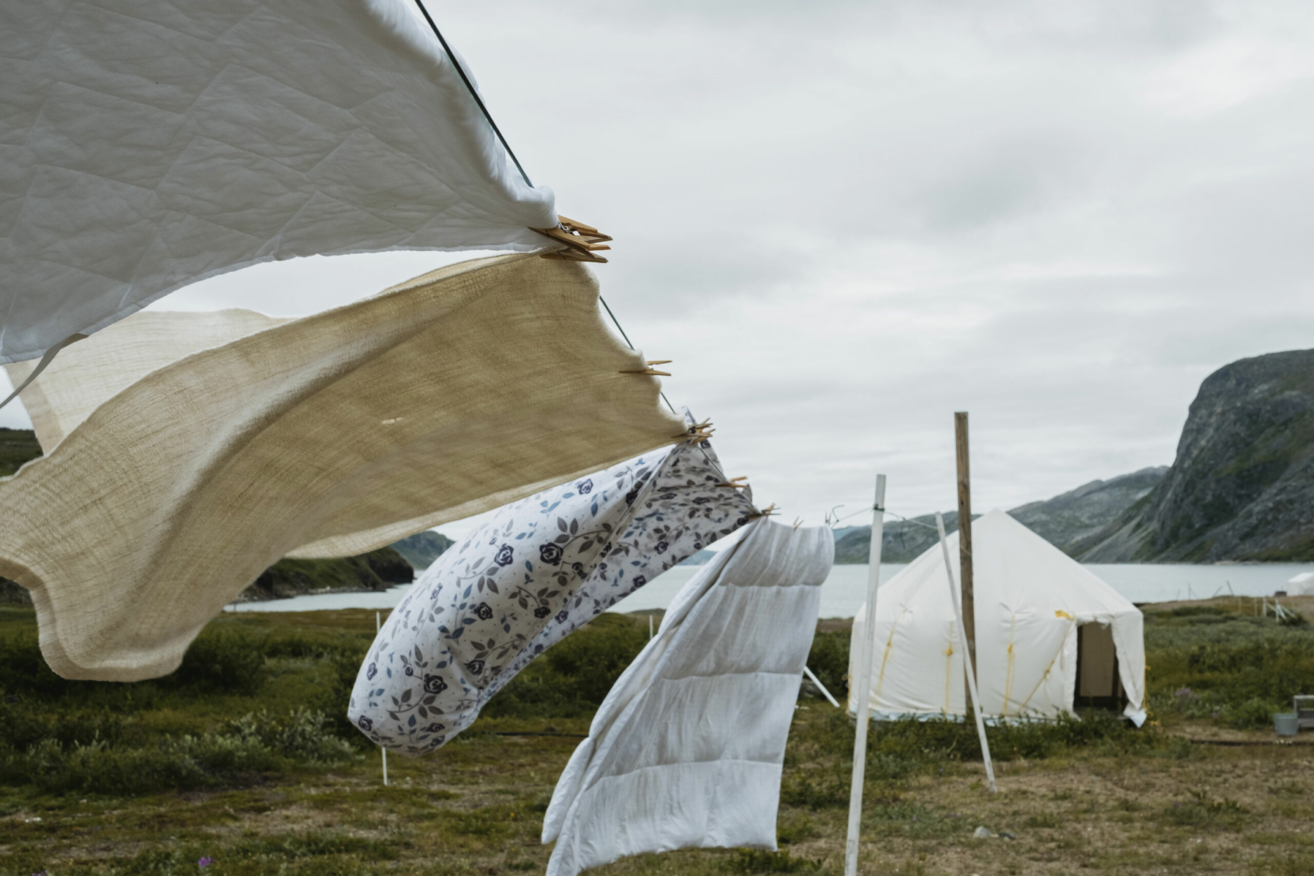 Linen and bedsheets hang to dry at Torngat Mountains National Park basecamp.