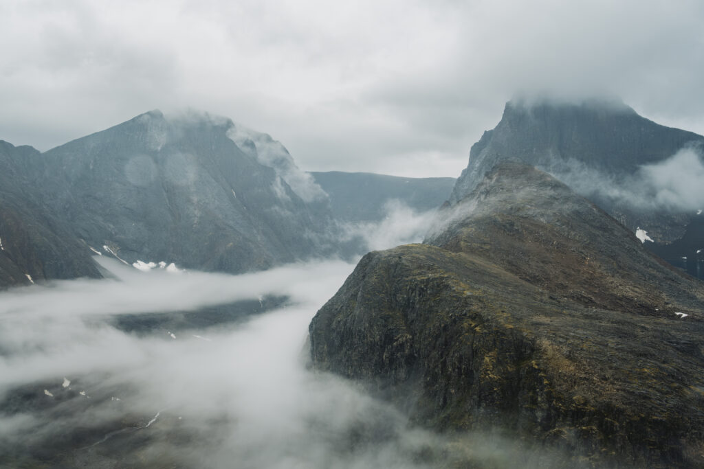 Aerial view of Torngat Mountains peaks in the fog
