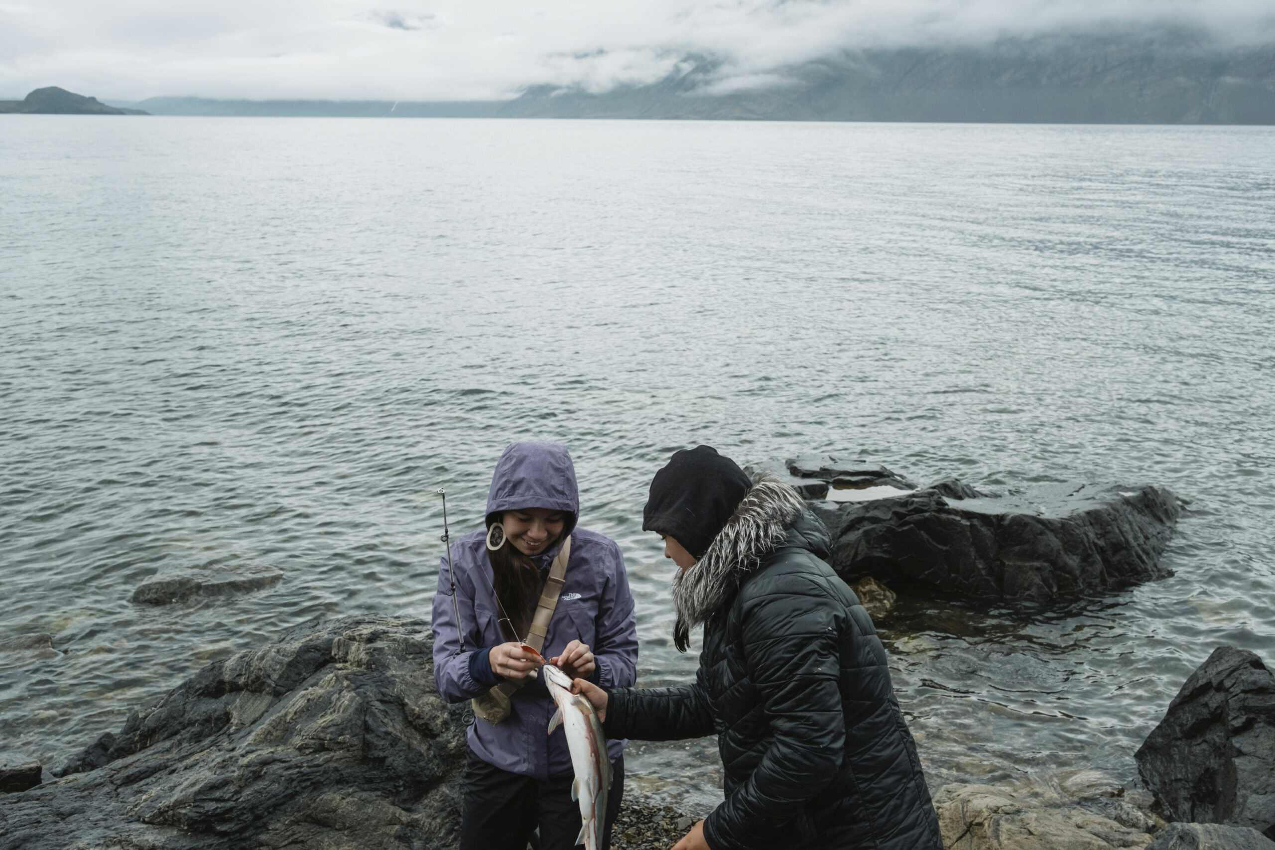 Participants from the Youth Leadership Program fish for Arctic char in Torngat Mountains National Park.