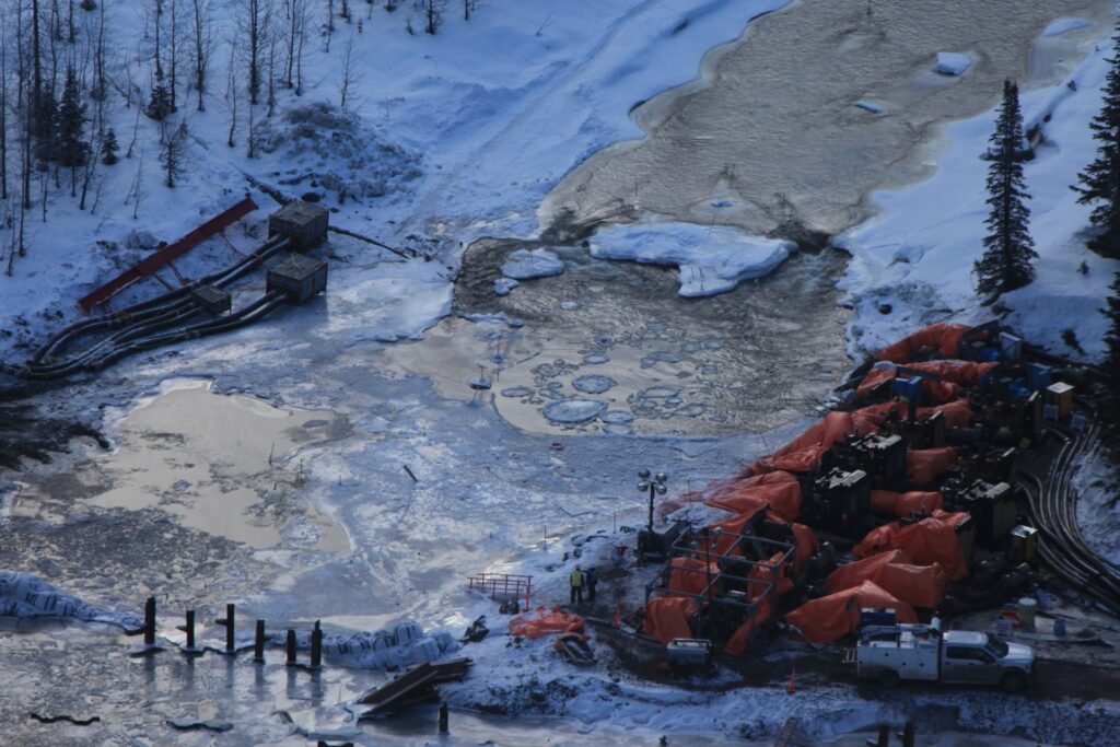 Coastal GasLink river crossing on Wet'suwet'en territory flooded in icy winter conditions
