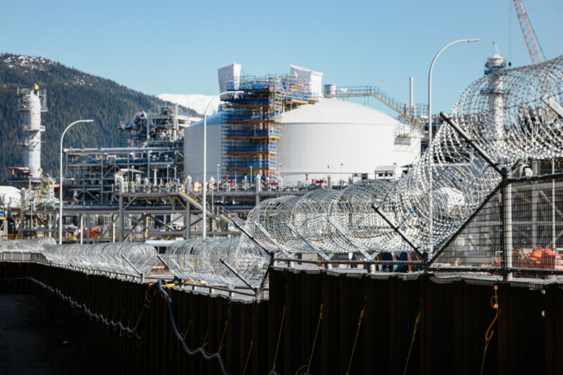 LNG Canada's liquefaction and export facility under construction in Kitimat, B.C., with razor wire fencing