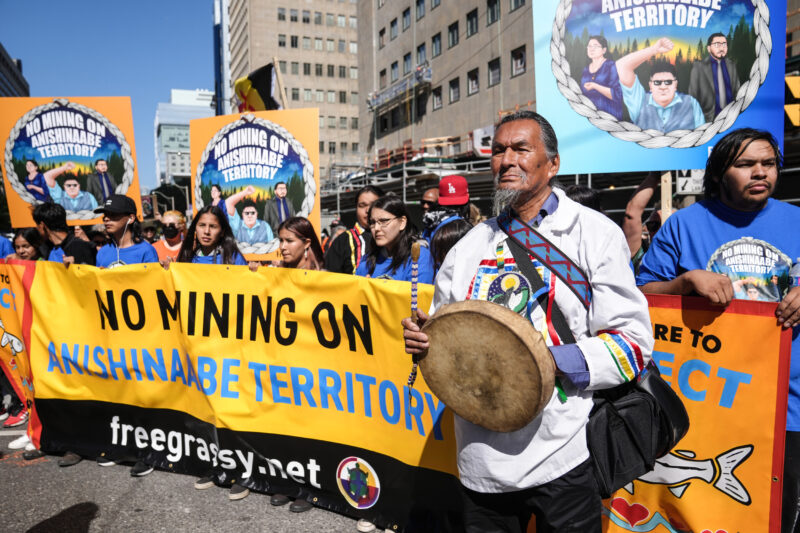 Alex Moonias of the Neskantaga First Nation and members of the four First Nations making up the Land Defence Alliance march against mining on their territories, Sept. 2023 in Toronto.