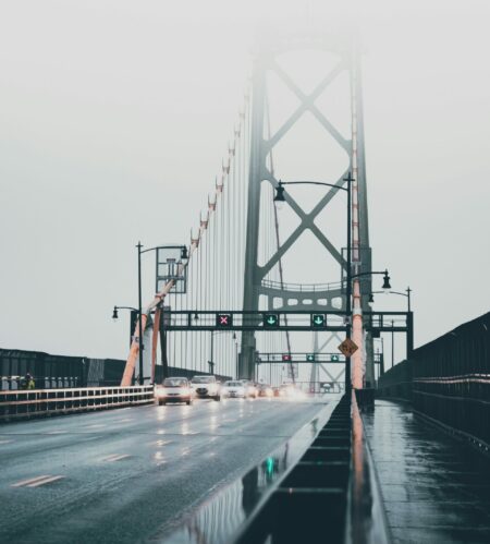 Cars drive through fog on the Macdonald Bridge in Halifax on a rainy day