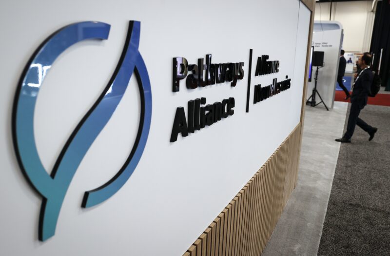 A Pathways Alliance sign is seen at the World Petroleum Congress in Calgary in 2023.