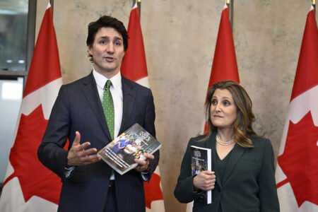 Prime Minister Justin Trudeau and Deputy Prime Minister and Minister of Finance Chrystia Freeland speak to media as they arrive to deliver the federal budget in the House of Commons on Parliament Hill in Ottawa, Tuesday, March 28, 2023. THE CANADIAN PRESS/Justin Tang
