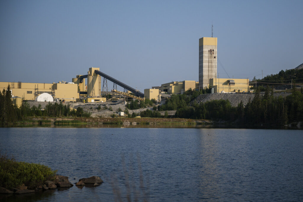 Lake Superior caribou: industrial buildings next to water