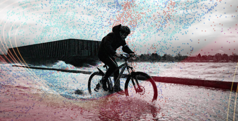 an illustration of a solitary cyclist riding through water during flooding