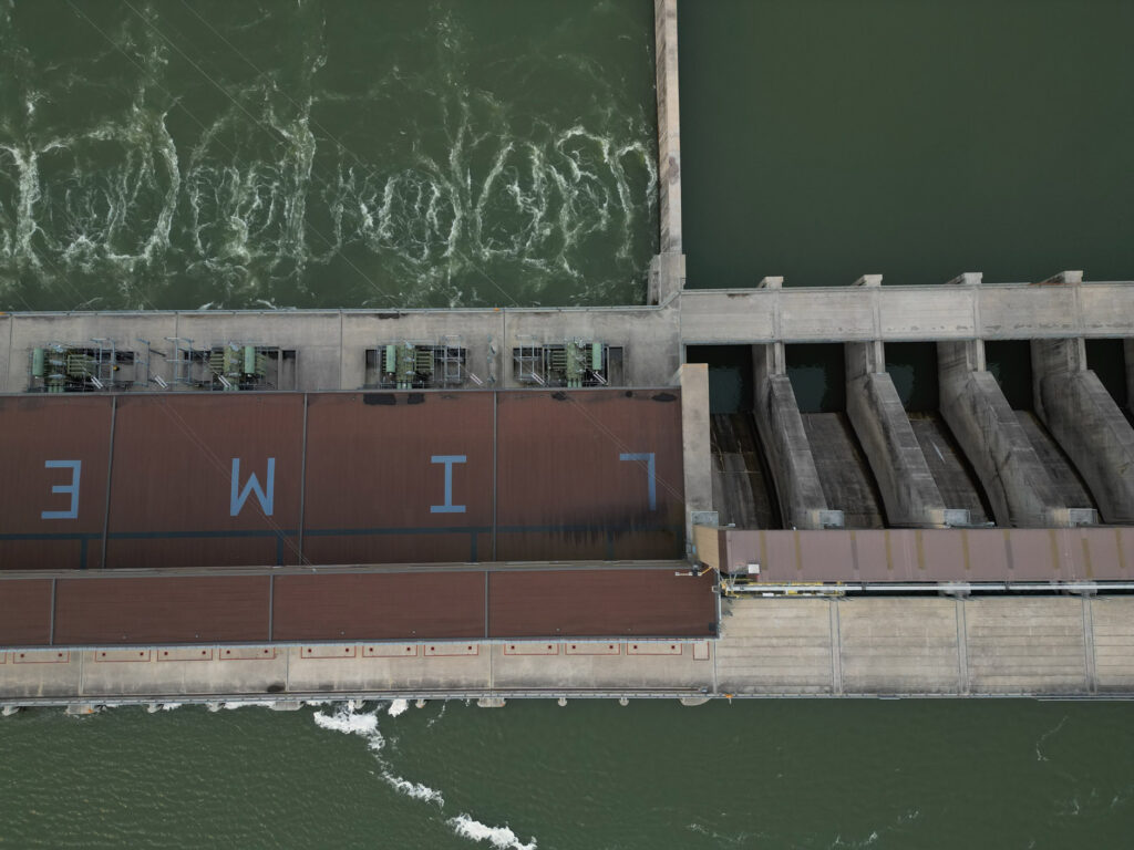 An aerial view of water swirling near the Manitoba Hydro Limestone Generating Station on the Nelson River