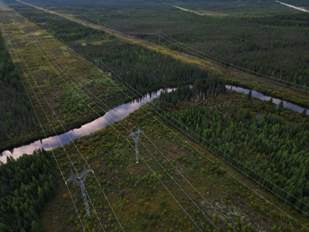 Manitoba Hydro power lines traverse the forests, bogs, rivers and streams as seen from above