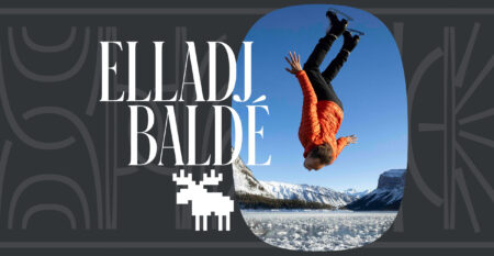 A photo of figure skater Elladj Baldé doing a flip on ice surrounded by the Rocky Mountains, inset in a background that says his name and has an icon of a pixelated moose.