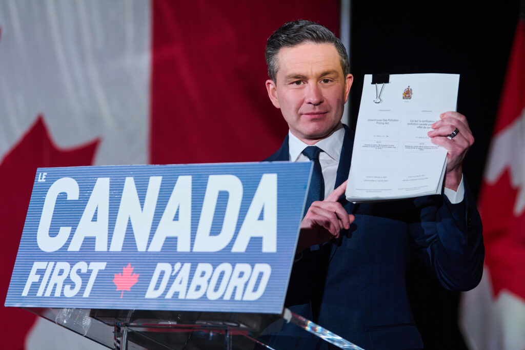 Conservative Leader Pierre Poilievre speaks at a news conference in Ottawa on March 14, 2024, reacting to the unveiling of Prime Minister Mark Carney's new cabinet.