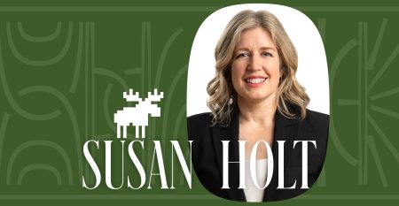 A photo of New Brunswick Premier Susan Holt on a green background with an image of a pixelated moose next to her name.