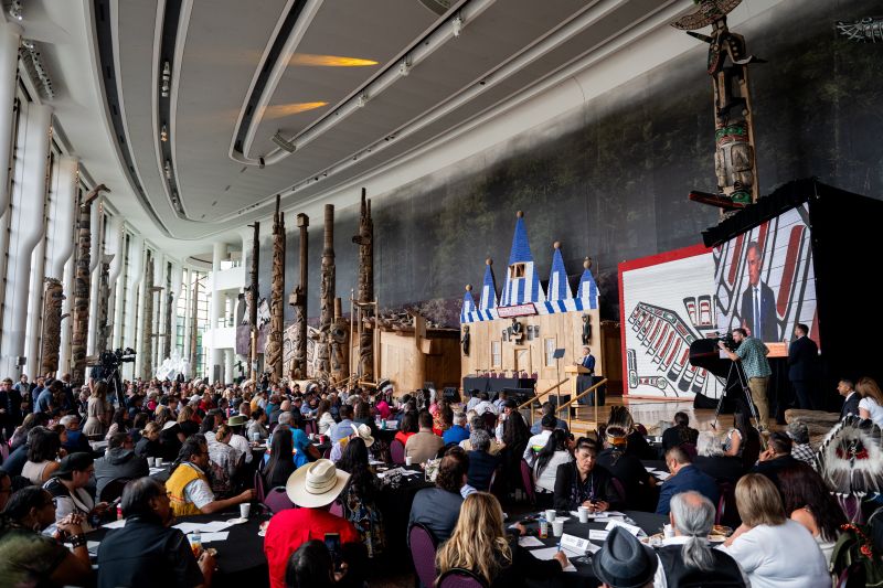 A group of First Nations chiefs in a large conference room
