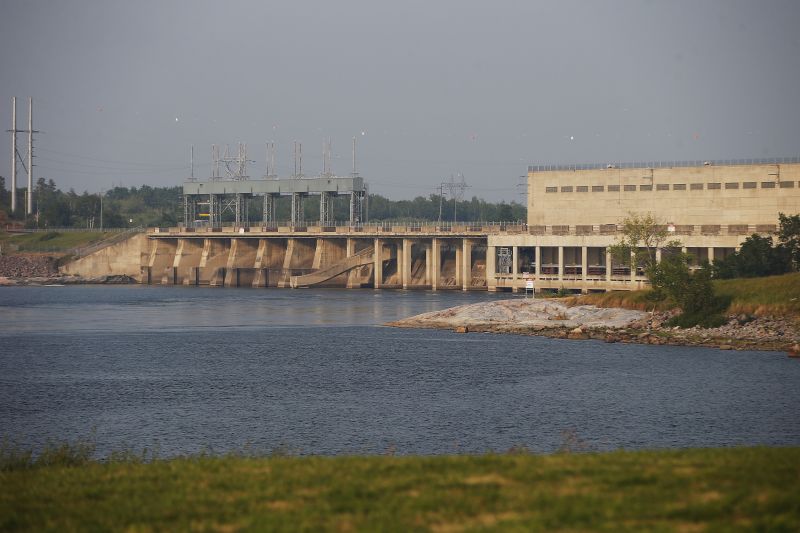 A hydro dam along the Winnipeg River on a hazy day.