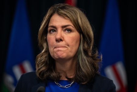 Alberta Premier Danielle Smith purses her lips