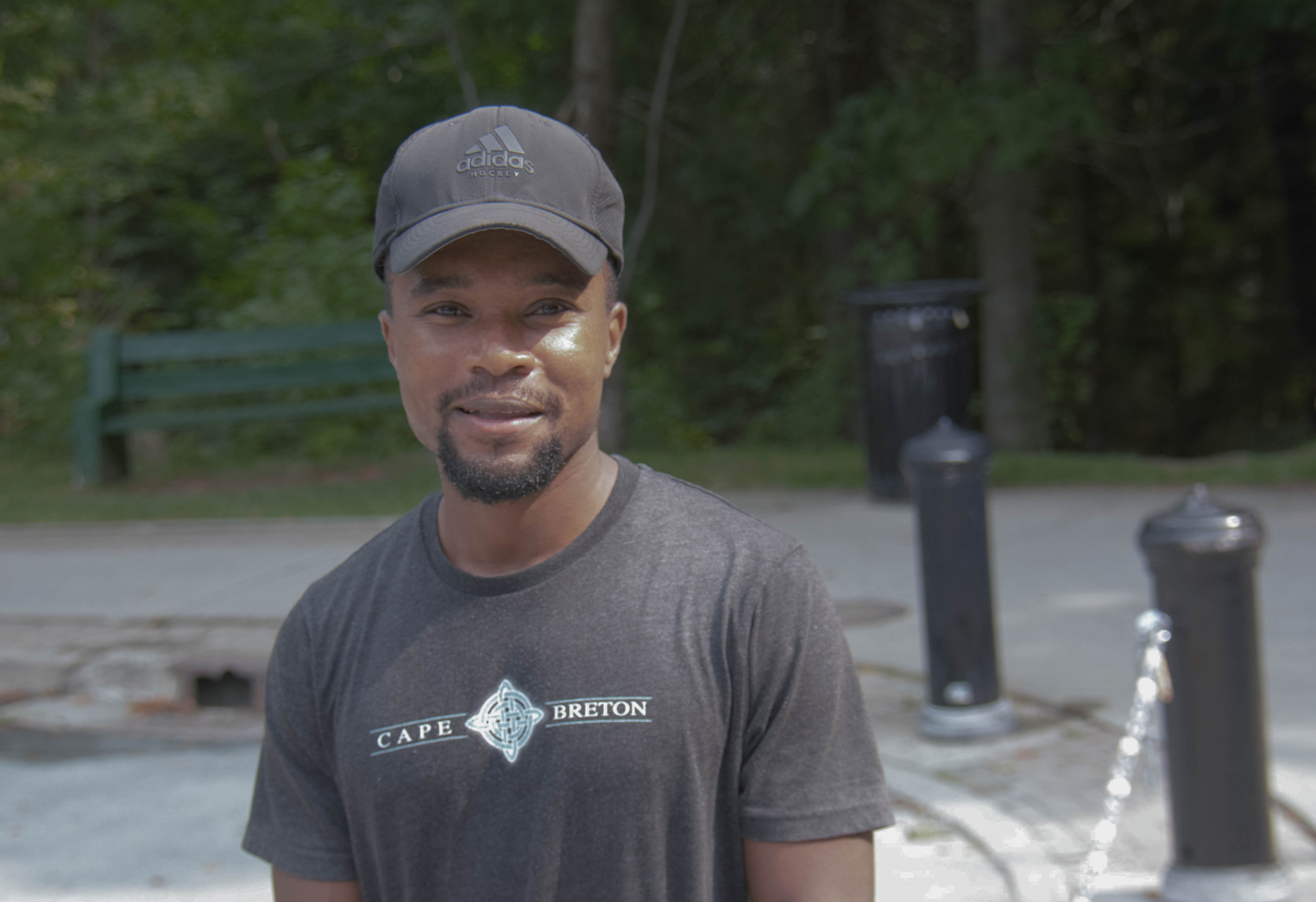 A man poses for a photo in Halifax's Point Pleasant Park, which recently reopened after weeks of closure due to the Nova Scotia government's woods ban.