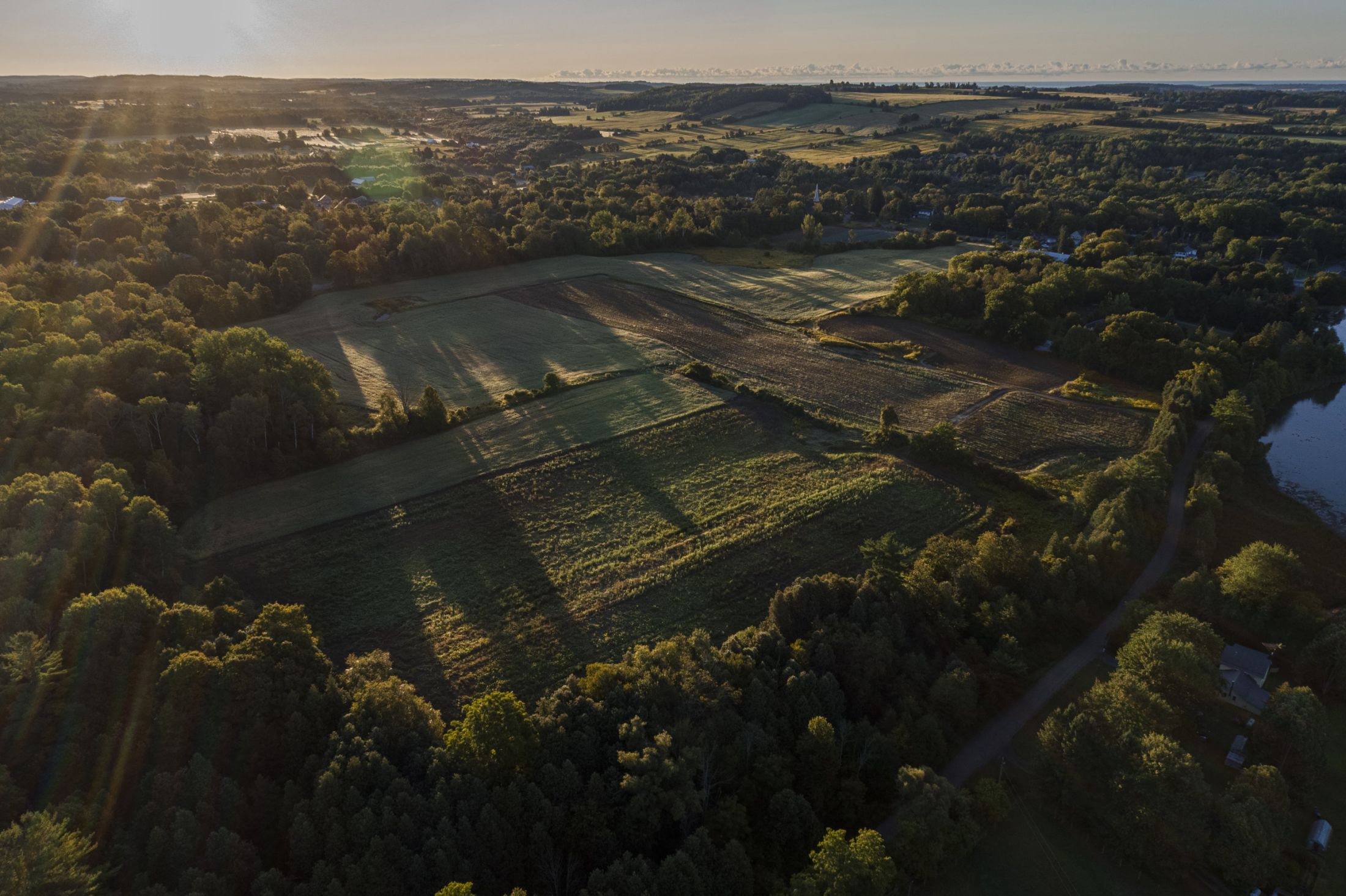 An aerial image of a parcel of land in Garden Hill, Ont. The land is currently used to grow crops. But it's now set to become a subdivision after the provincial government removed its designation as an Area of Natural and Scientific Interest.