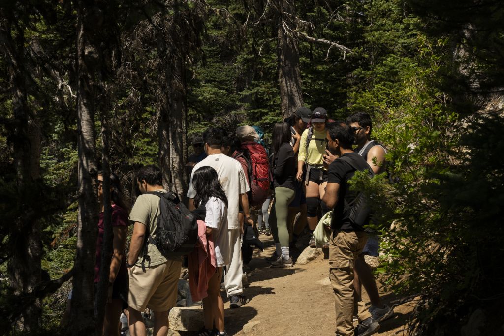 Hikers line up for photos at Joffre Lakes.
