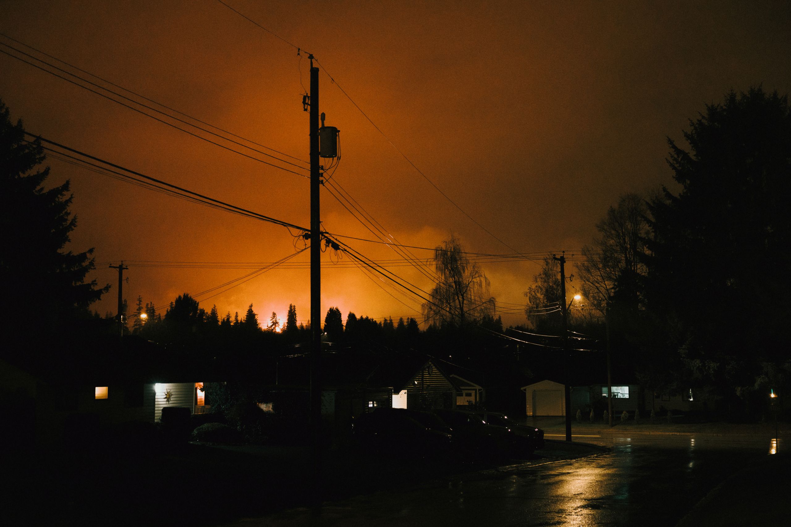 An orange sky caused by LNG Canada's flaring at night in Kitimat, B.C.