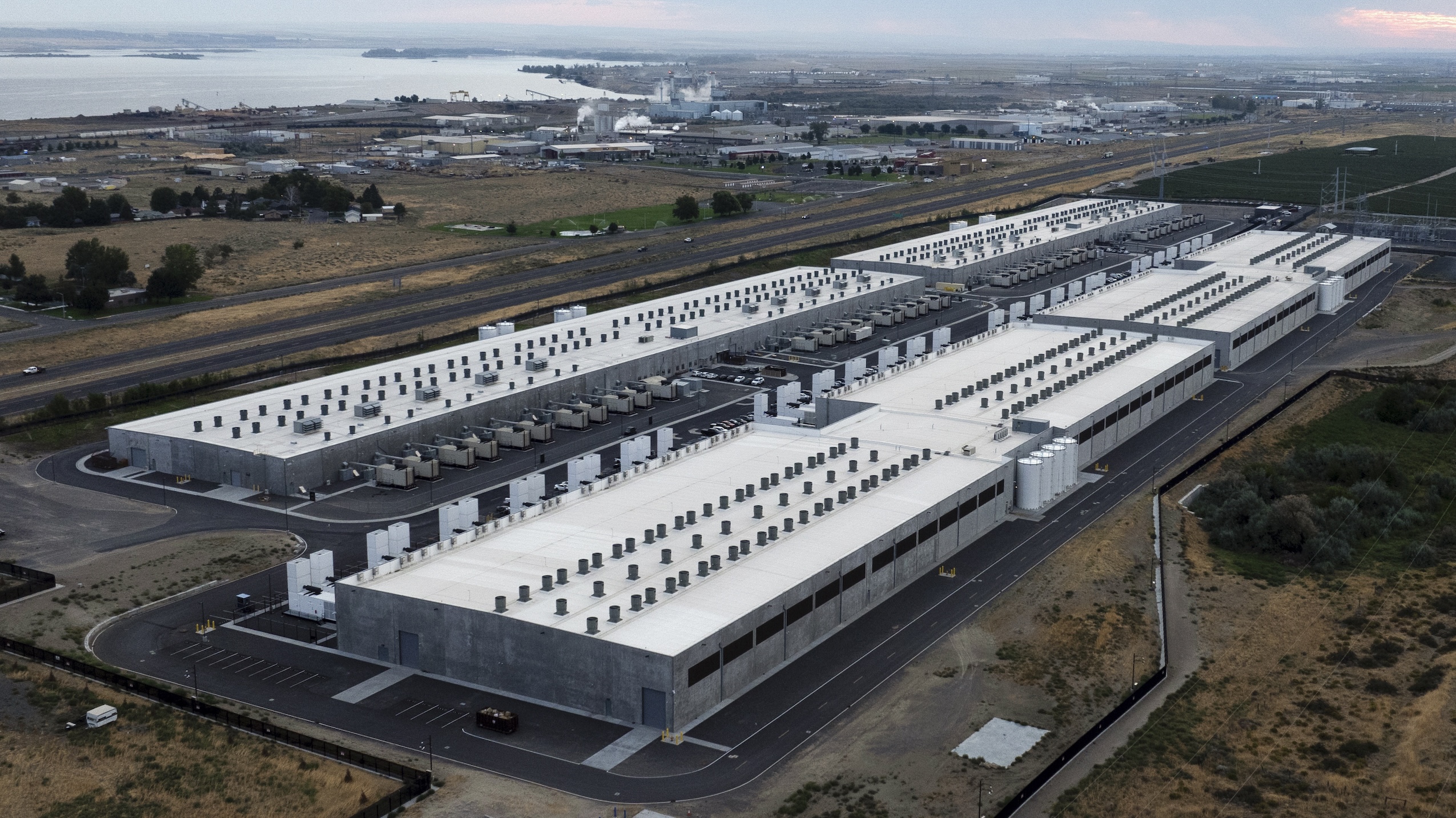 An overhead view of Amazon Web Services' data centre in Boardman, Ore., two rows of low, rectangular concrete buildings