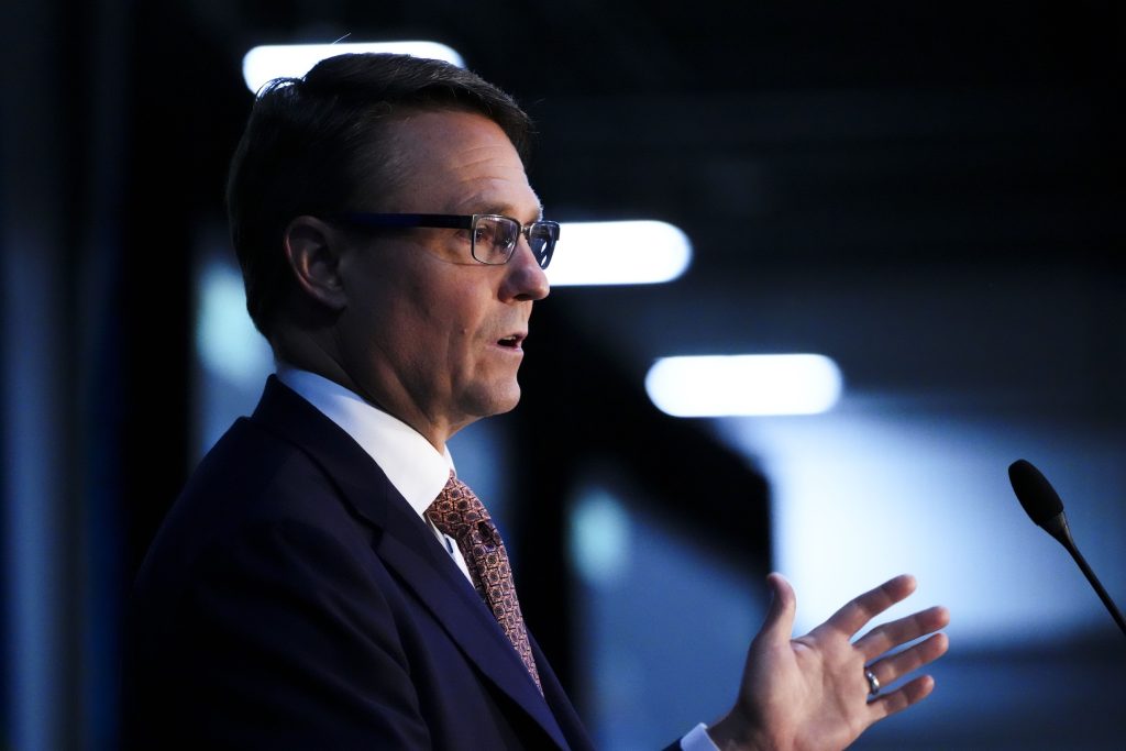 John Graham, CEO of the Canada Pension Plan Investment Board, speaks at a convention.