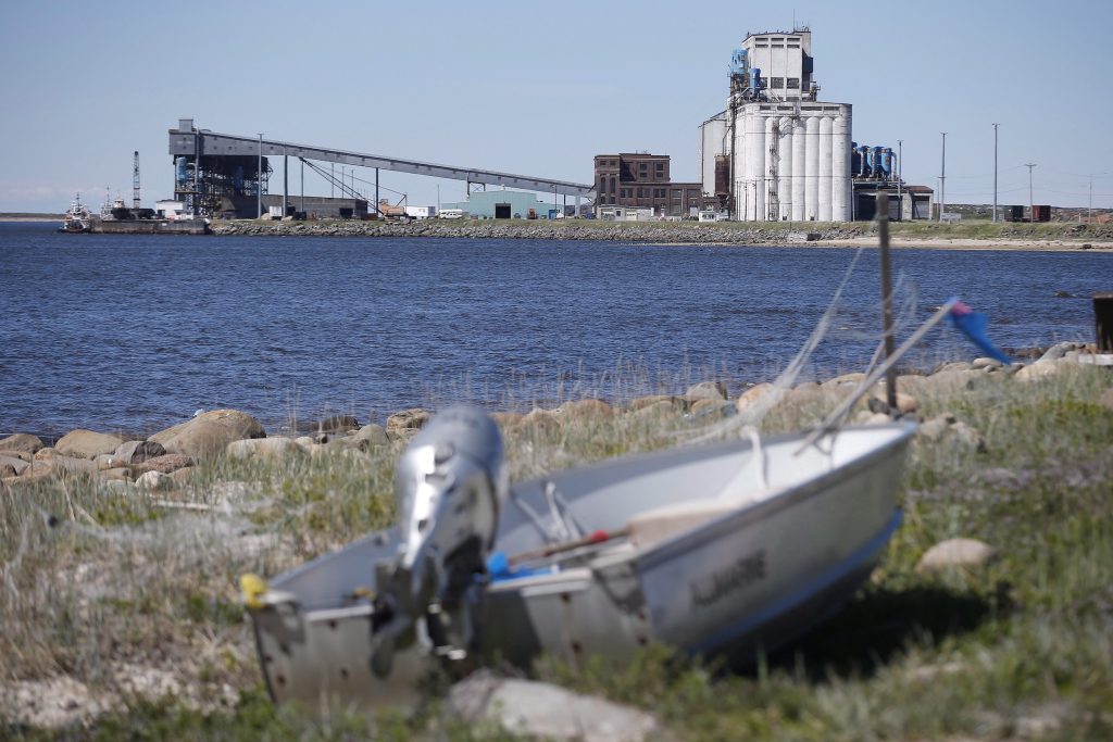 The Port of Churchill is seen in summer 2025, with an out-of-focus boat in the foreground.
