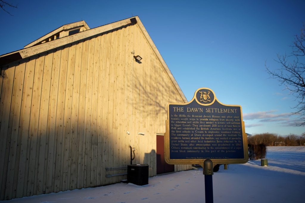 A historical plaque commemorating the Dawn Settlement is pictured in Dresden