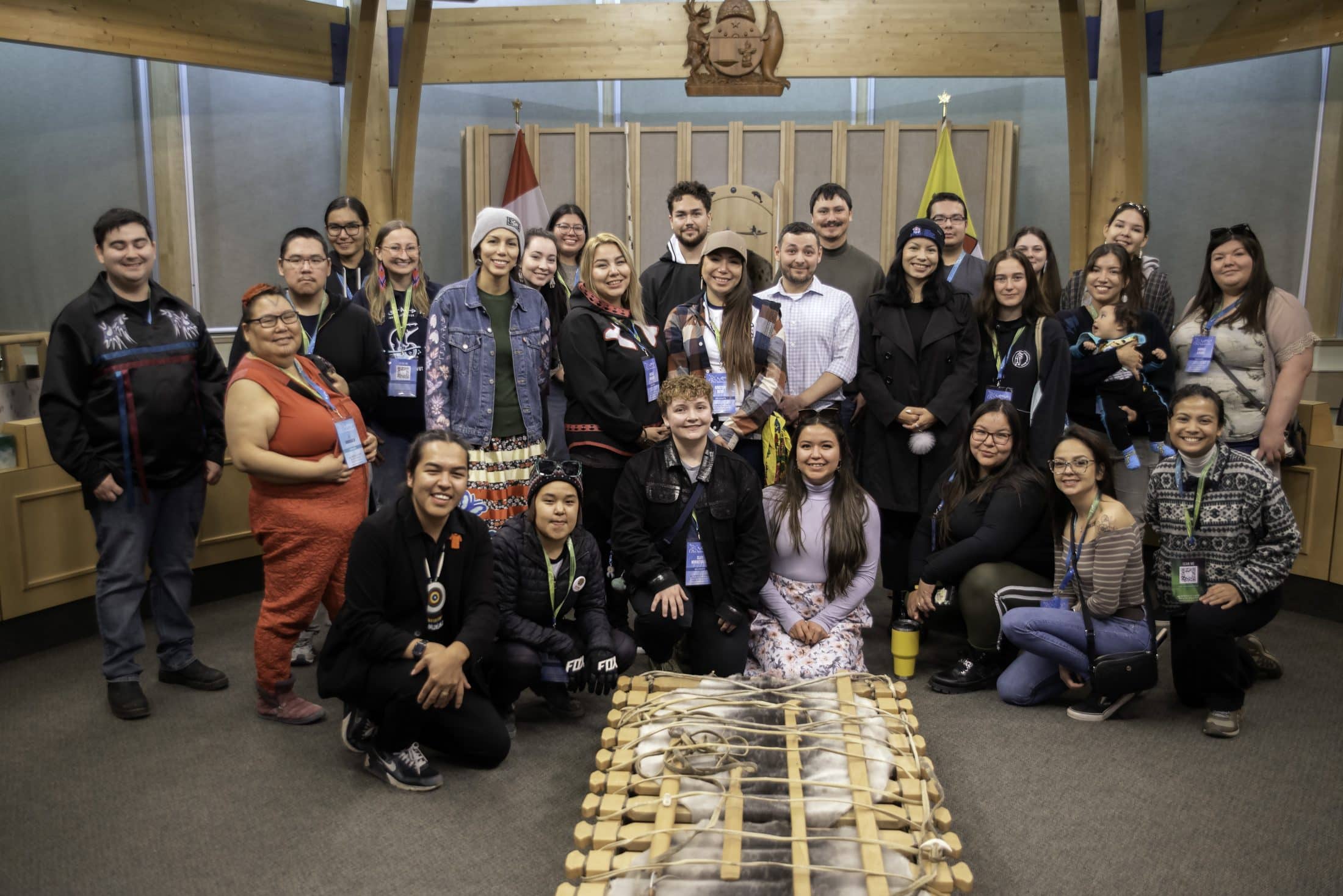 A group of Indigenous Clean Energy delegates in the Nunavut legislature