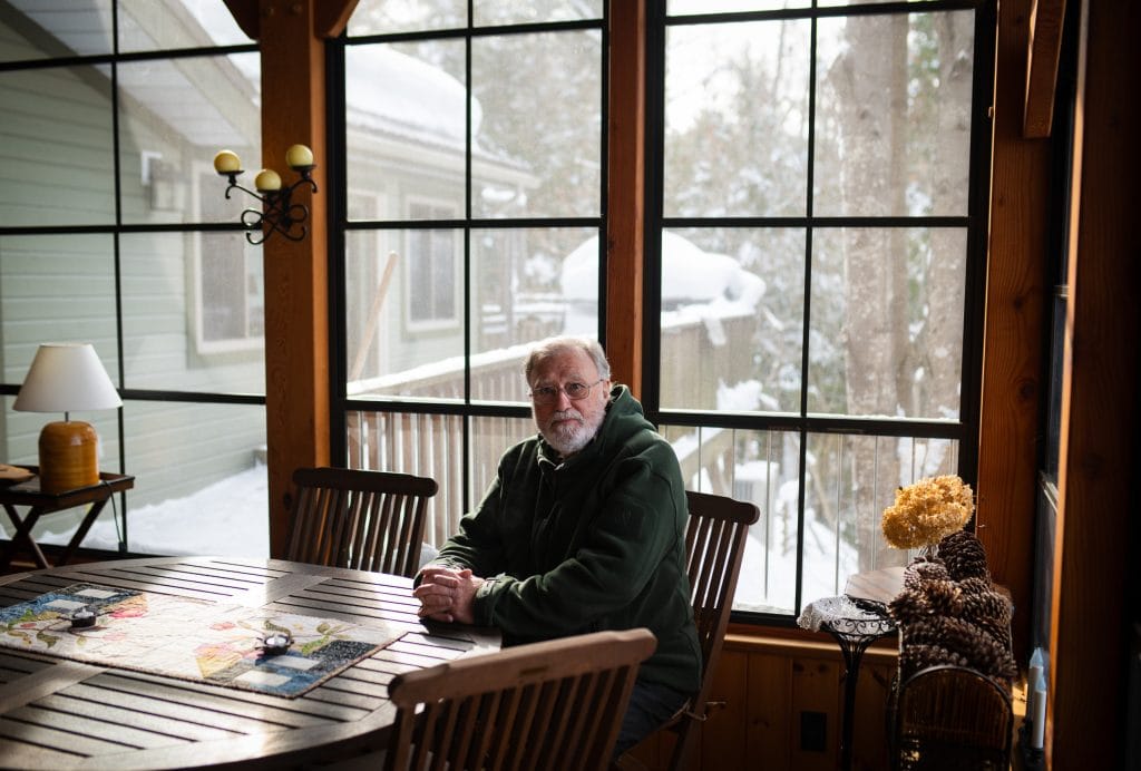 Terry Moore, president of the Haliburton Highlands Green Burial Society, poses for a portrait in his home.