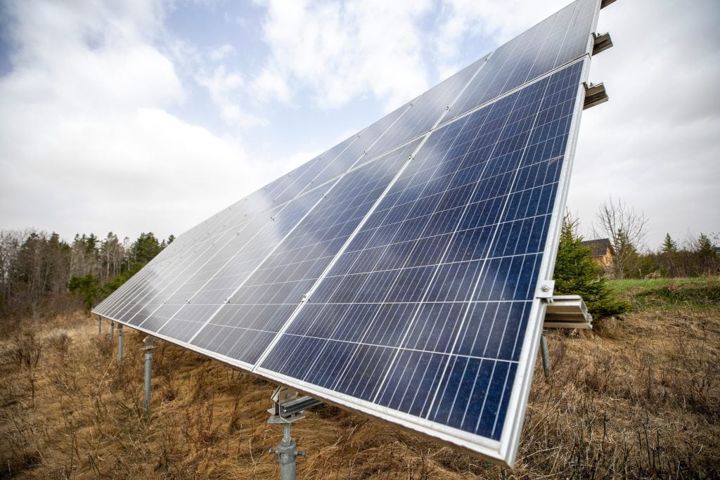 A large solar array in a field